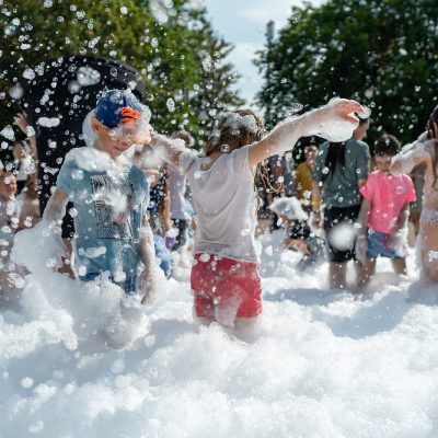 Kids playing in foam.