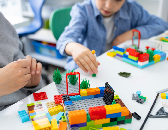 Kids building with Lego.